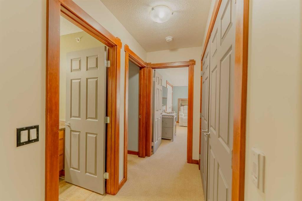 313-170 Crossbow Place, Canmore, AB - Indoor Photo Showing Other Room