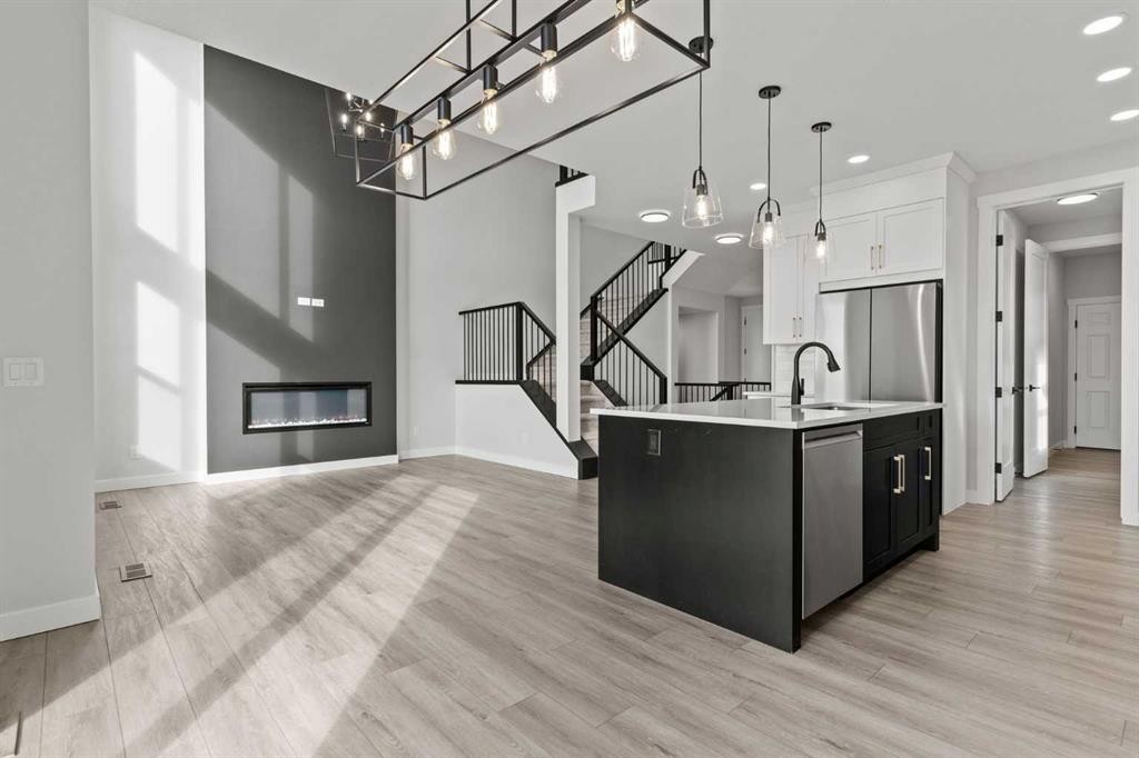 302 Kinniburgh Loop, Chestermere, AB - Indoor Photo Showing Kitchen With Upgraded Kitchen