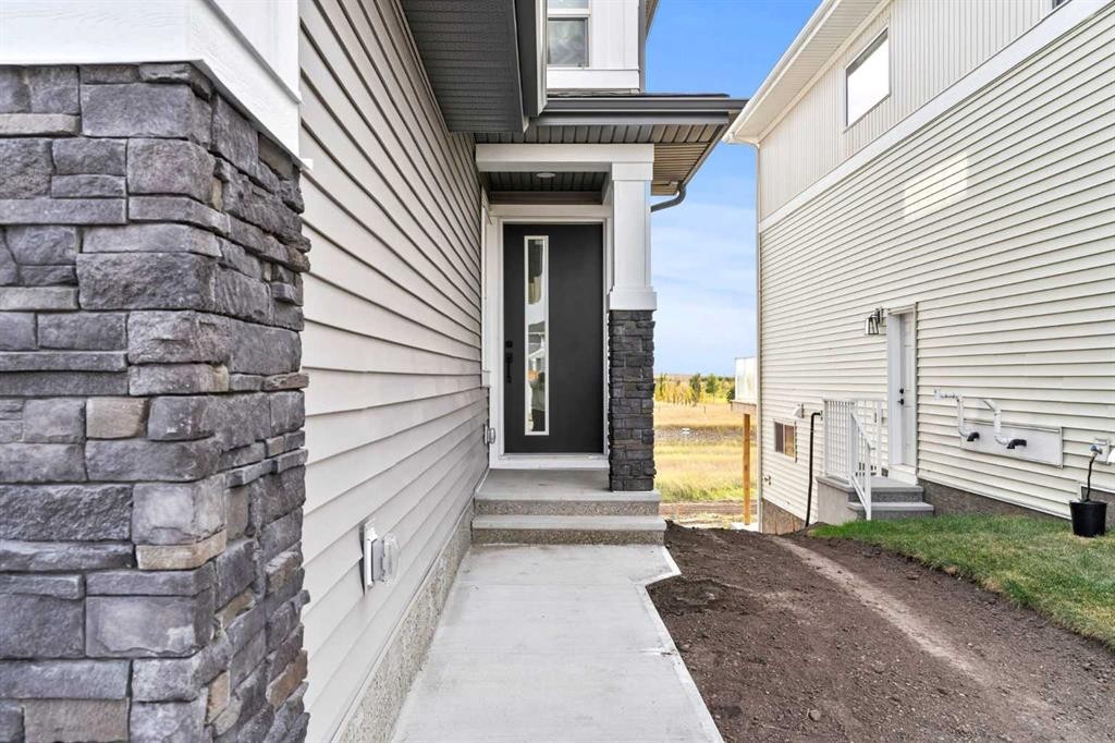 302 Kinniburgh Loop, Chestermere, AB - Outdoor With Exterior