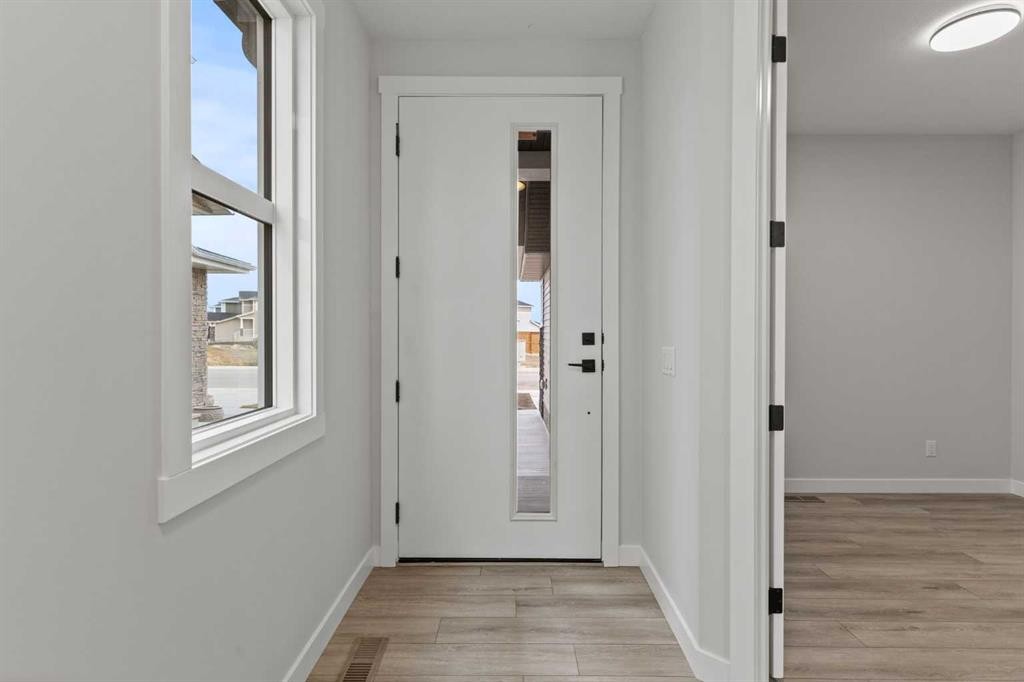 302 Kinniburgh Loop, Chestermere, AB - Indoor Photo Showing Other Room