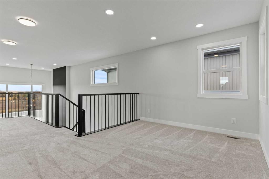 302 Kinniburgh Loop, Chestermere, AB - Indoor Photo Showing Other Room