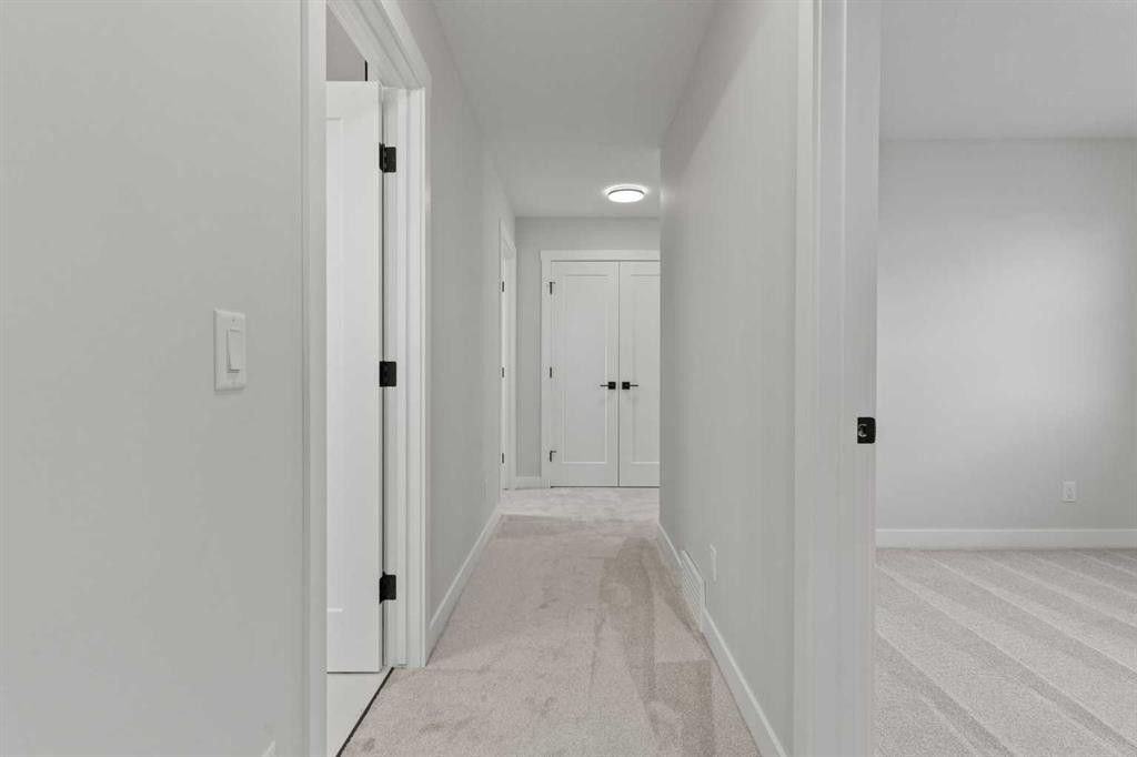 302 Kinniburgh Loop, Chestermere, AB - Indoor Photo Showing Other Room