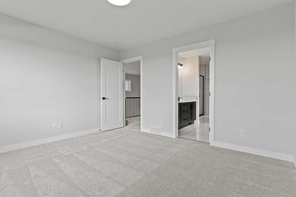 302 Kinniburgh Loop, Chestermere, AB - Indoor Photo Showing Other Room