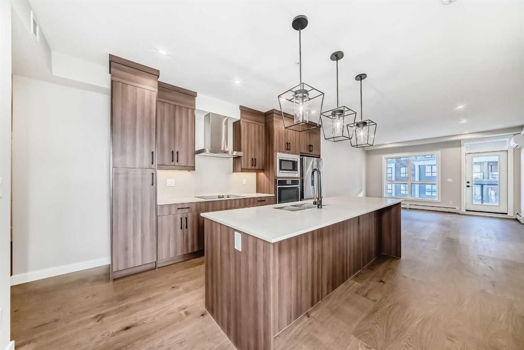 7121-1802 Mahogany Boulevard Se, Calgary, AB - Indoor Photo Showing Kitchen With Upgraded Kitchen