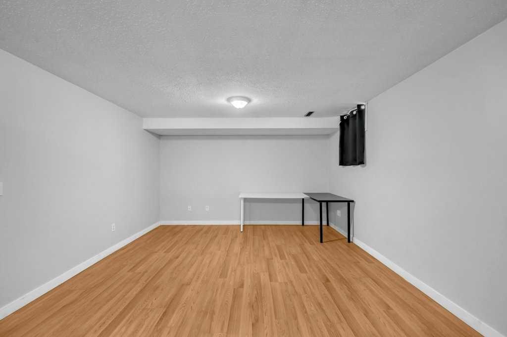 1140 Abbeydale Drive Ne, Calgary, AB - Indoor Photo Showing Other Room