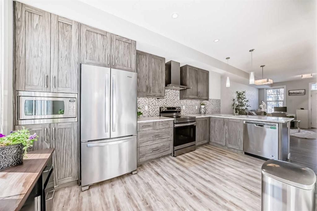 4143 Seton Drive Se, Calgary, AB - Indoor Photo Showing Kitchen With Upgraded Kitchen