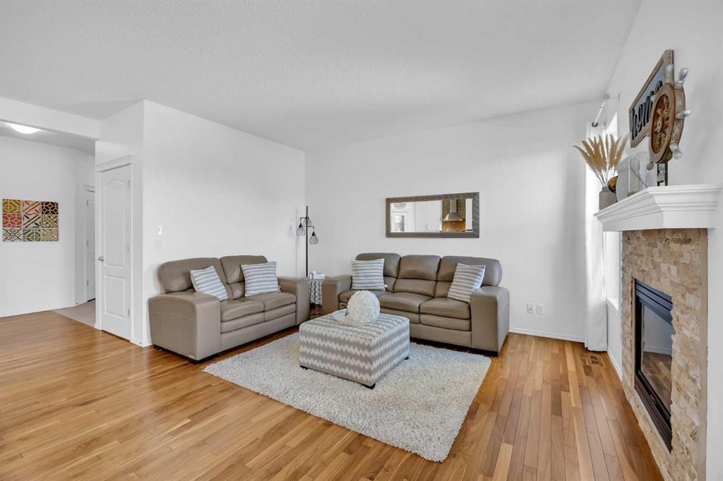 30 Cranarch View Se, Calgary, AB - Indoor Photo Showing Living Room With Fireplace