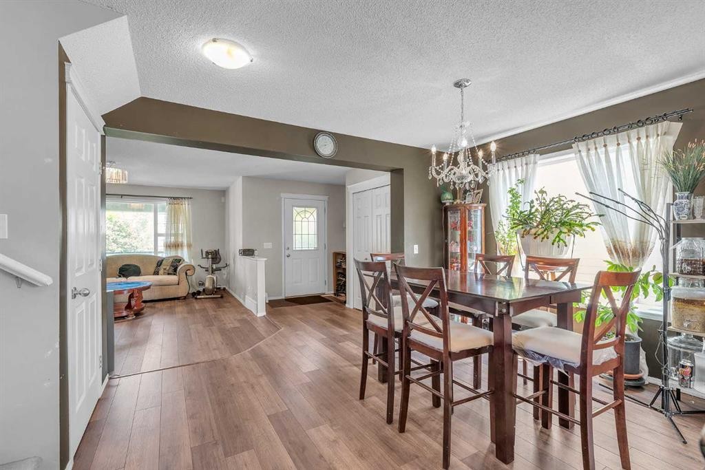 115 Evermeadow Avenue Sw, Calgary, AB - Indoor Photo Showing Dining Room