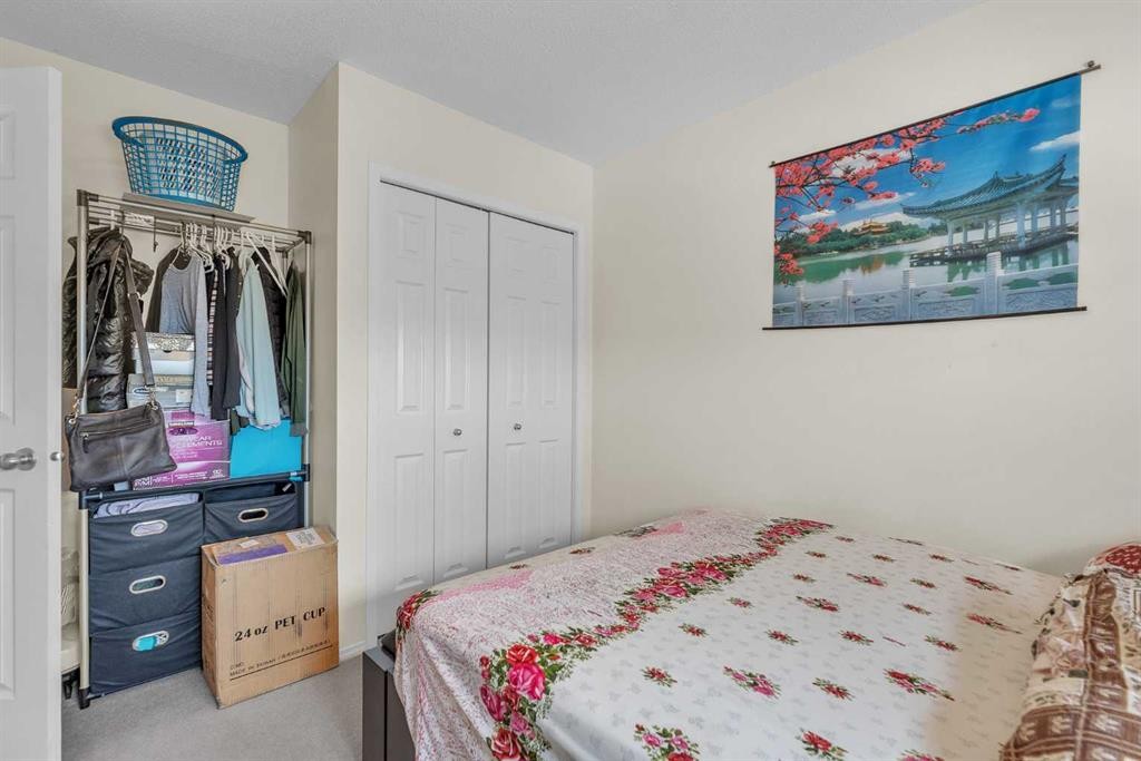 115 Evermeadow Avenue Sw, Calgary, AB - Indoor Photo Showing Bedroom