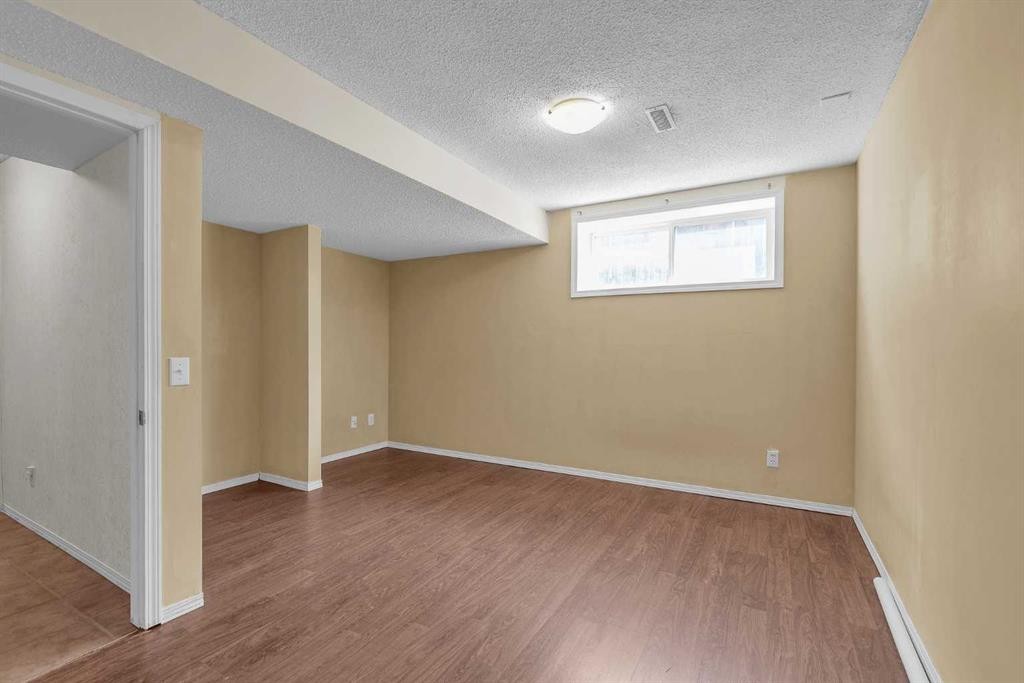 115 Evermeadow Avenue Sw, Calgary, AB - Indoor Photo Showing Other Room
