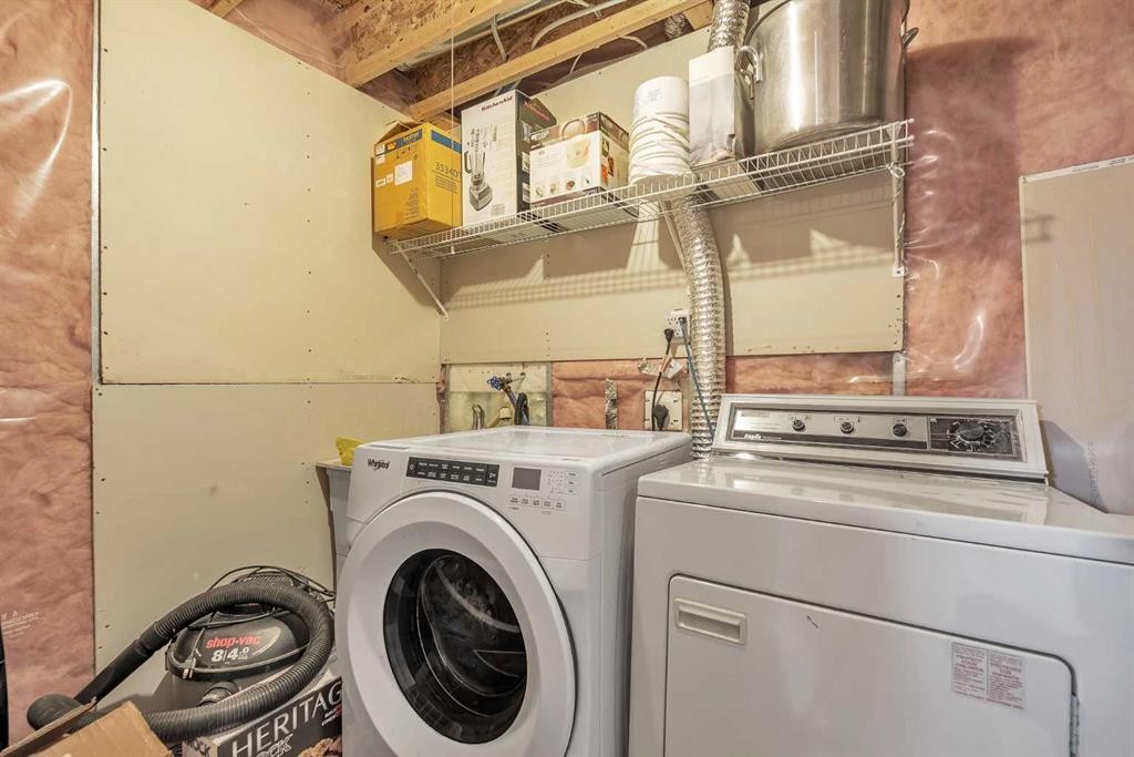 115 Evermeadow Avenue Sw, Calgary, AB - Indoor Photo Showing Laundry Room