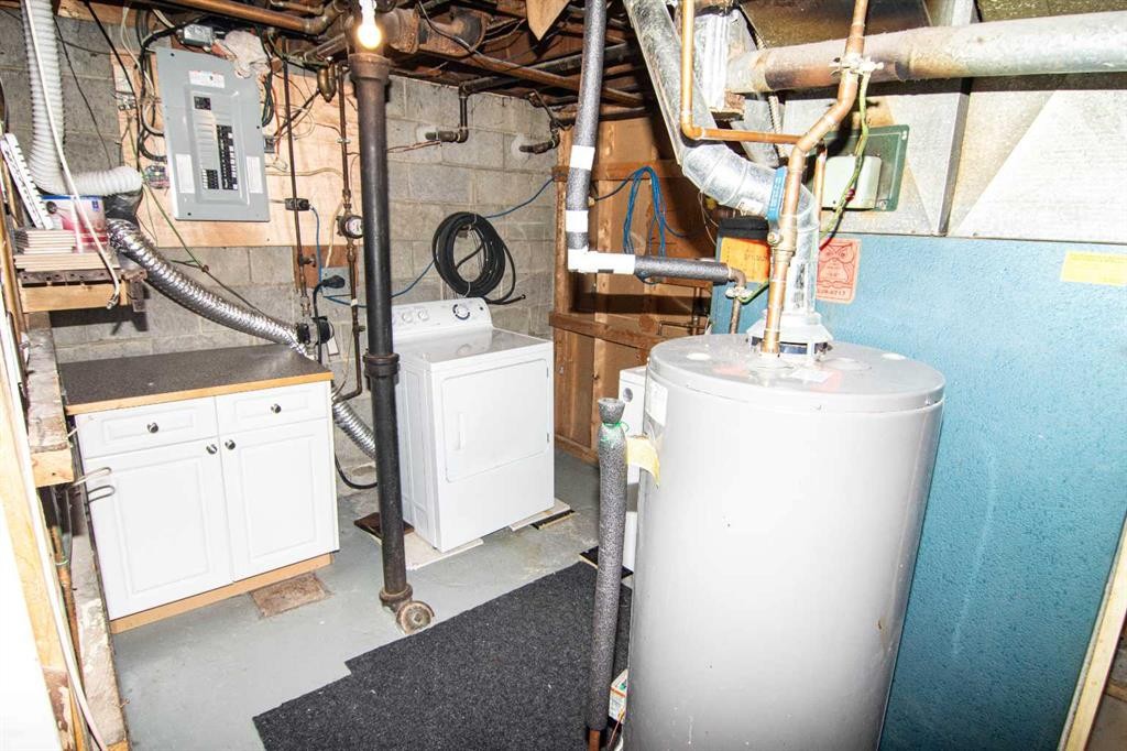 7012 Bowness Road Nw, Calgary, AB - Indoor Photo Showing Laundry Room
