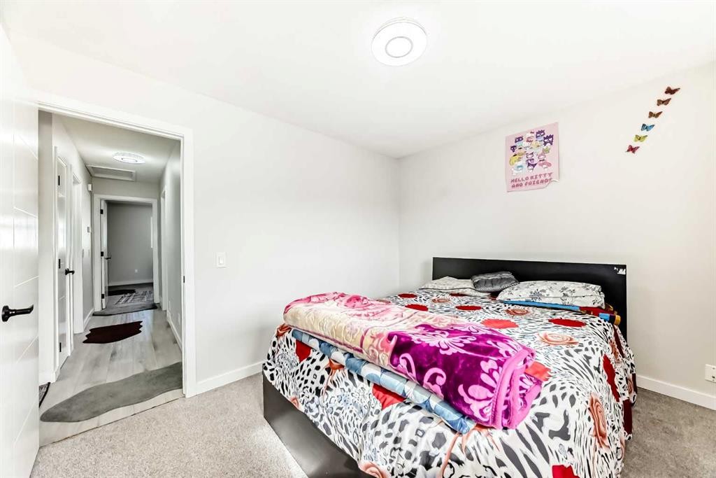 6712 23 Avenue Ne, Calgary, AB - Indoor Photo Showing Bedroom