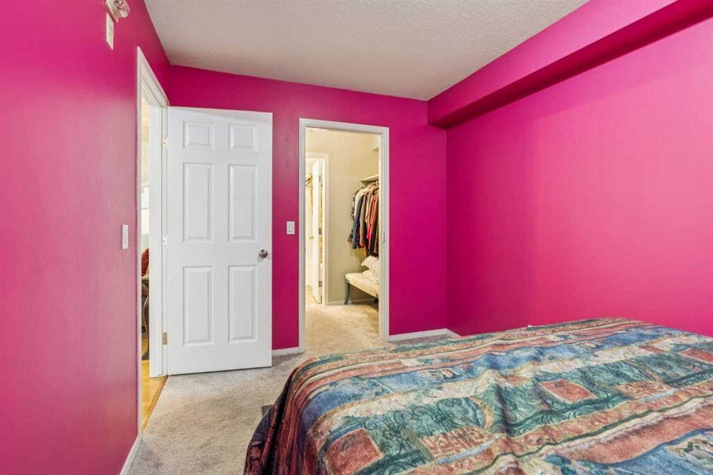 105-15320 Bannister Road Se, Calgary, AB - Indoor Photo Showing Bedroom