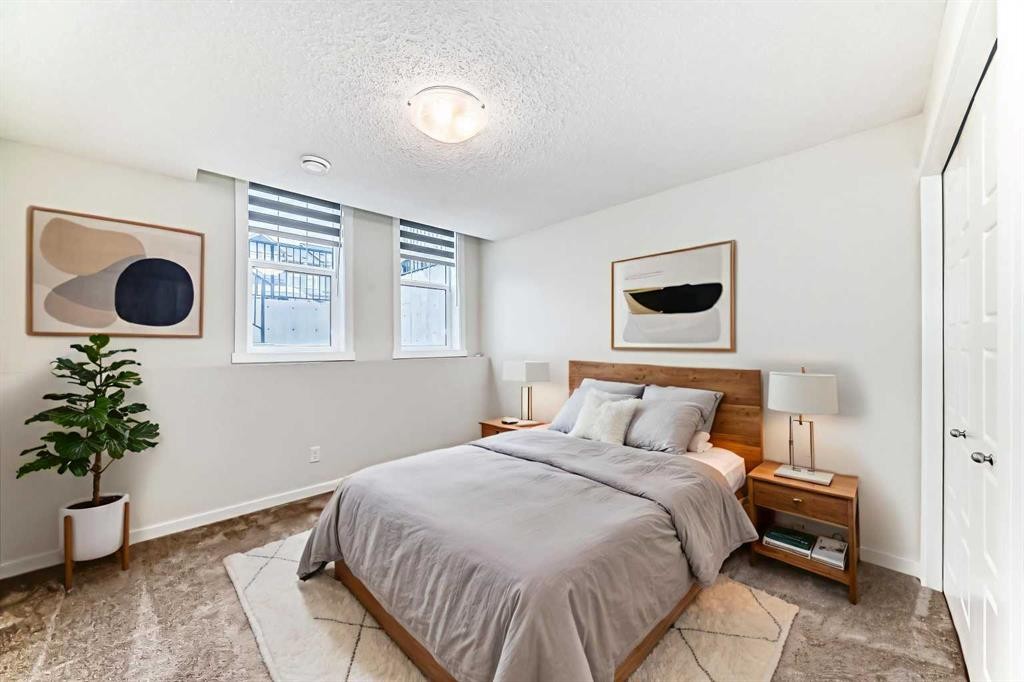 152 Cranbrook Square Se, Calgary, AB - Indoor Photo Showing Bedroom