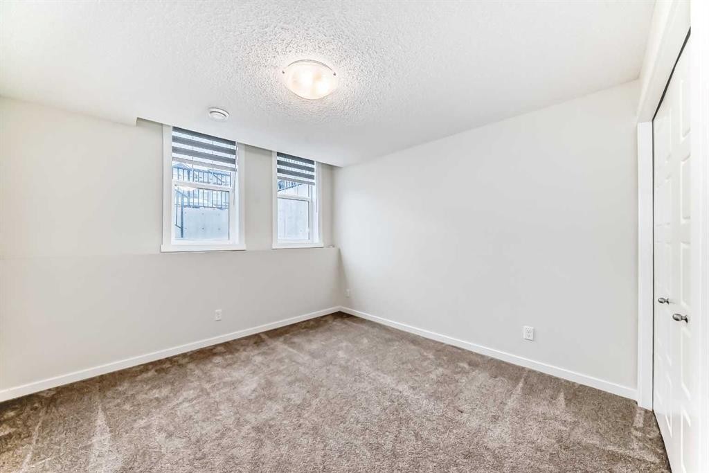 152 Cranbrook Square Se, Calgary, AB - Indoor Photo Showing Other Room