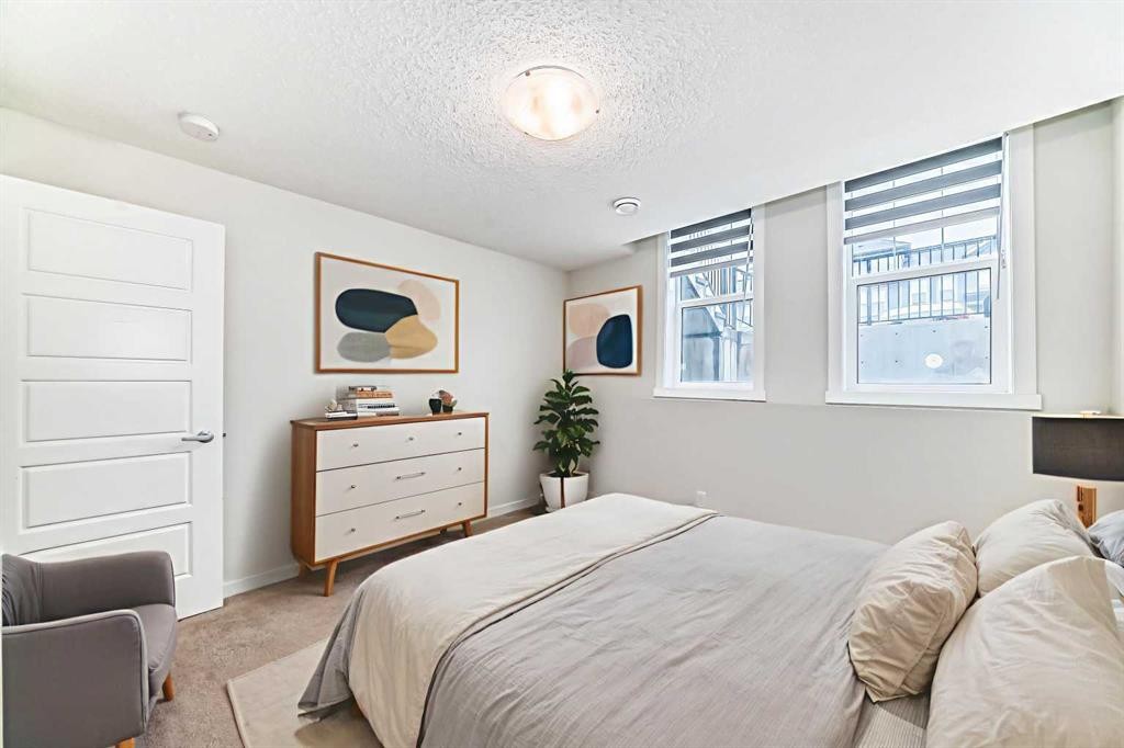 152 Cranbrook Square Se, Calgary, AB - Indoor Photo Showing Bedroom