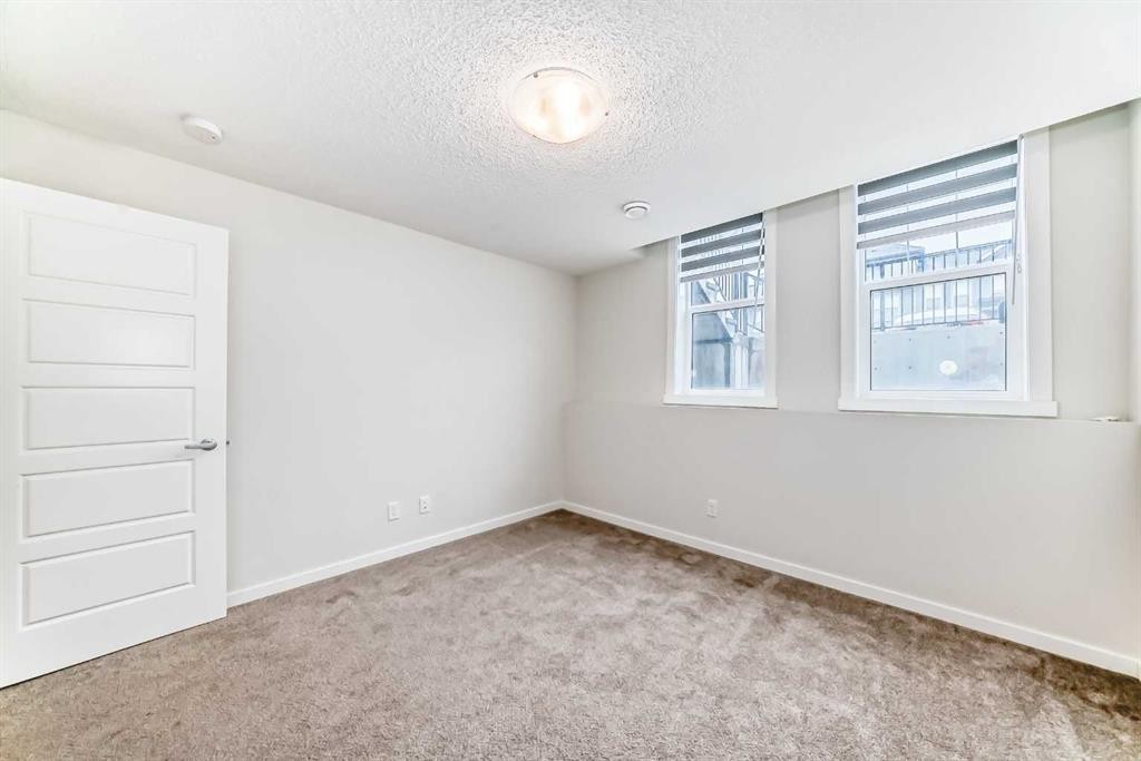 152 Cranbrook Square Se, Calgary, AB - Indoor Photo Showing Other Room