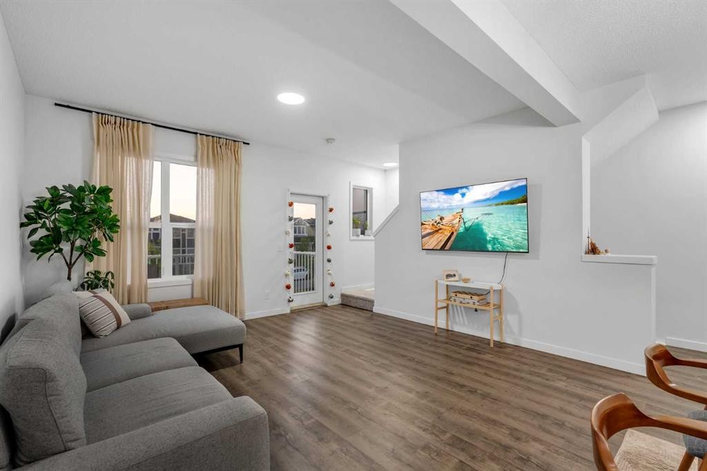 28 Redstone Boulevard Ne, Calgary, AB - Indoor Photo Showing Living Room