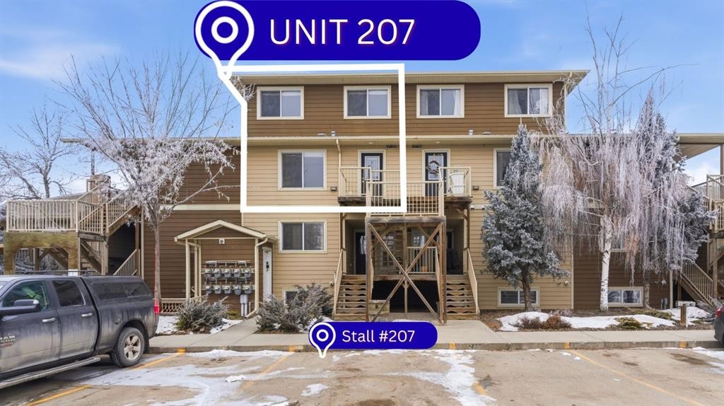 207-323 Fourth Avenue, Strathmore, AB - Outdoor With Facade
