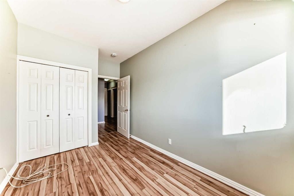 205-7 Lineham Avenue, Okotoks, AB - Indoor Photo Showing Other Room