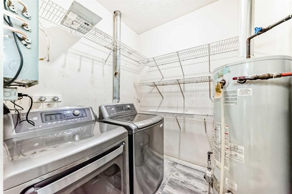205-7 Lineham Avenue, Okotoks, AB - Indoor Photo Showing Laundry Room