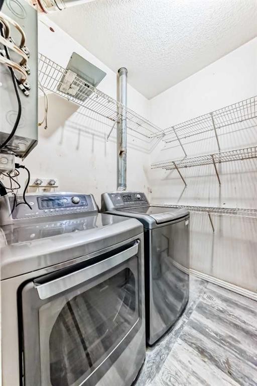 205-7 Lineham Avenue, Okotoks, AB - Indoor Photo Showing Laundry Room