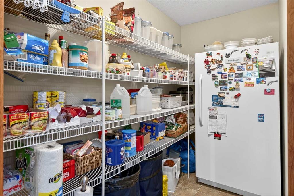 125 Copeland Close, Langdon, AB - Indoor With Storage
