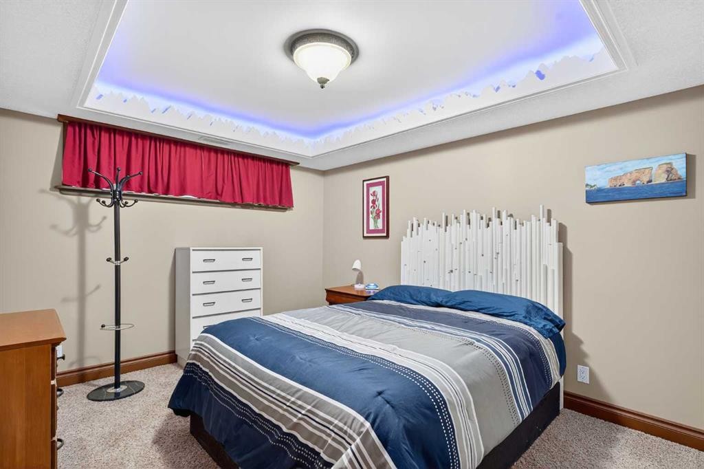 125 Copeland Close, Langdon, AB - Indoor Photo Showing Bedroom