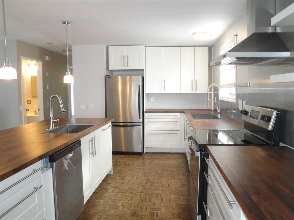 88 Abingdon Court Ne, Calgary, AB - Indoor Photo Showing Kitchen With Stainless Steel Kitchen With Upgraded Kitchen