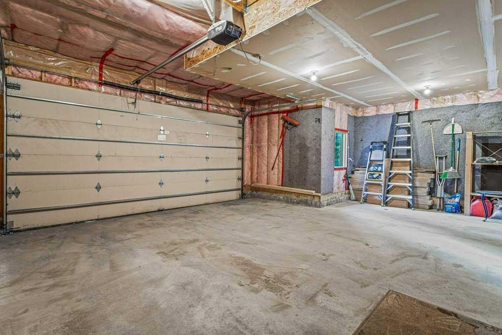 215 Miskow Close, Canmore, AB - Indoor Photo Showing Garage