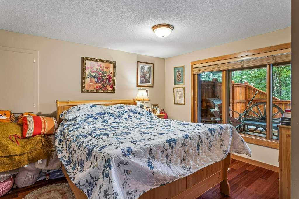 215 Miskow Close, Canmore, AB - Indoor Photo Showing Bedroom