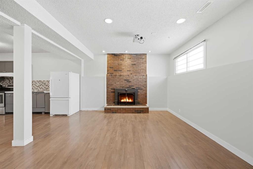 6011 Temple Drive Ne, Calgary, AB - Indoor With Fireplace