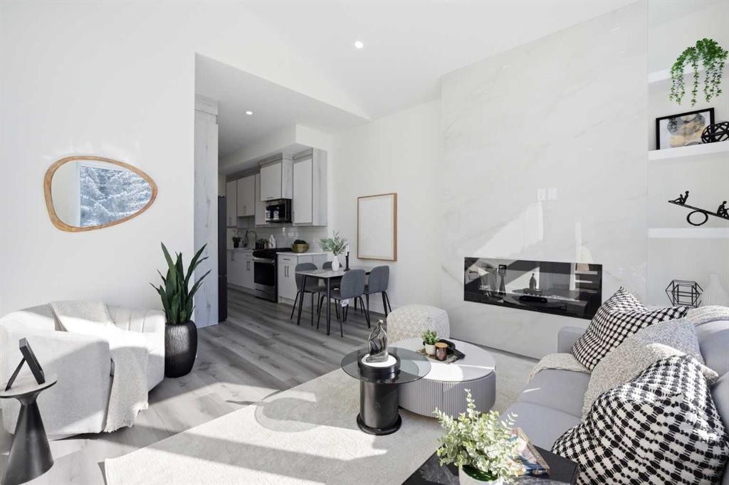 8520 33 Avenue Nw, Calgary, AB - Indoor Photo Showing Living Room With Fireplace