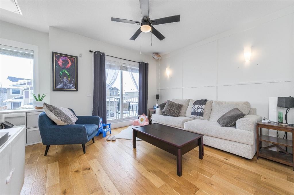 59-111 Rainbow Falls Gate, Chestermere, AB - Indoor Photo Showing Living Room