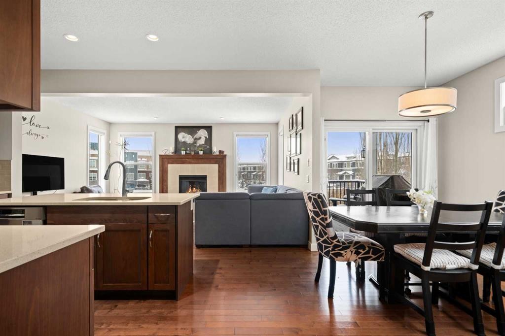 49 Evansview Manor Nw, Calgary, AB - Indoor Photo Showing Other Room With Fireplace