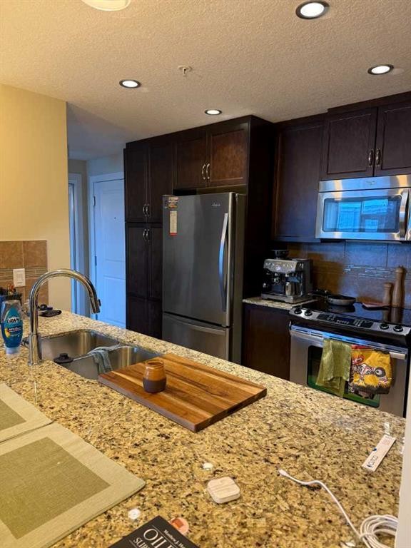 701-16 Varsity Estates Circle Nw, Calgary, AB - Indoor Photo Showing Kitchen With Stainless Steel Kitchen With Double Sink