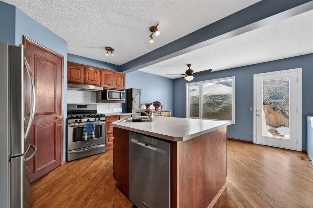 52 Riverwood Circle Se, Calgary, AB - Indoor Photo Showing Kitchen With Stainless Steel Kitchen