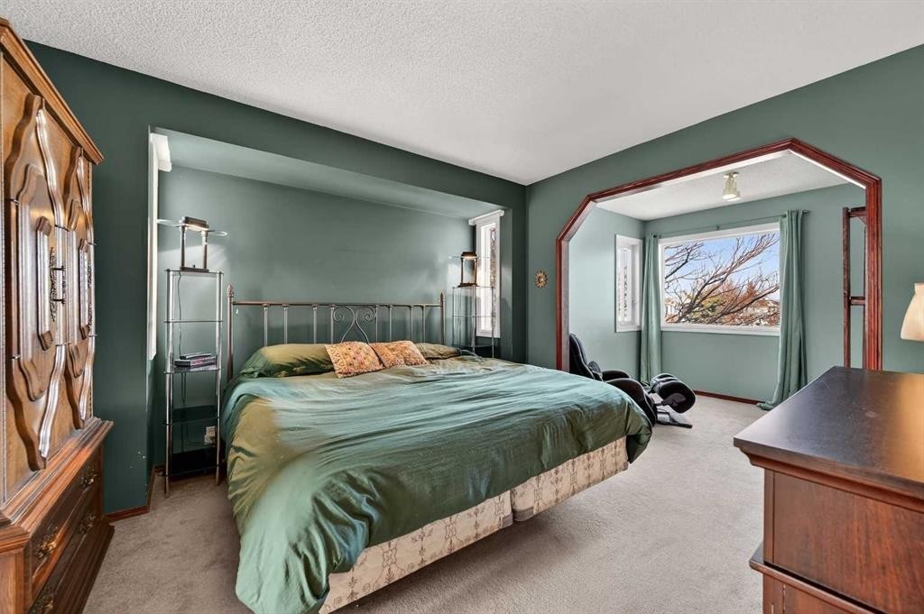 52 Riverwood Circle Se, Calgary, AB - Indoor Photo Showing Bedroom