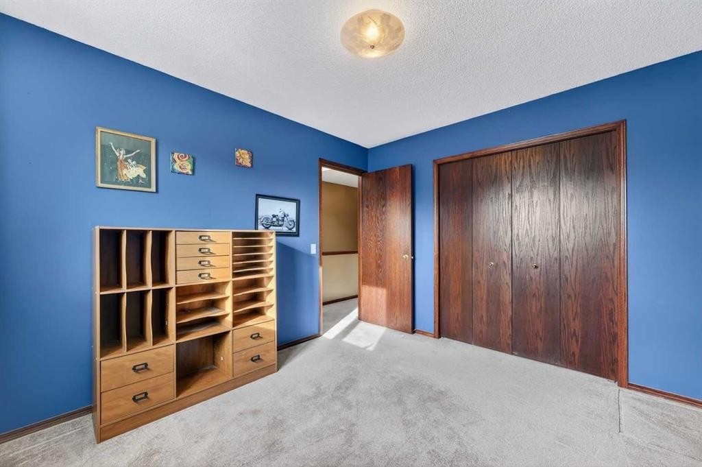 52 Riverwood Circle Se, Calgary, AB - Indoor Photo Showing Bedroom