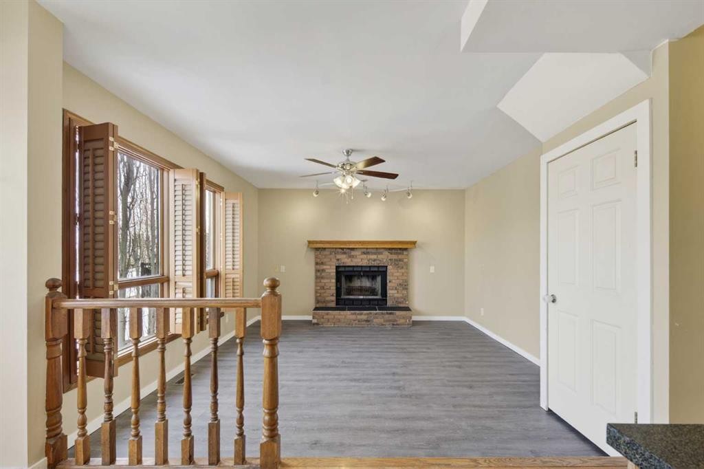 84 Rivergreen Crescent Se, Calgary, AB - Indoor With Fireplace