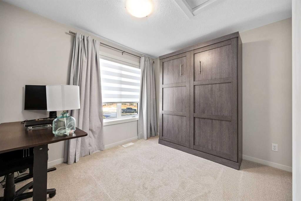 403-474 Seton Circle Se, Calgary, AB - Indoor Photo Showing Other Room