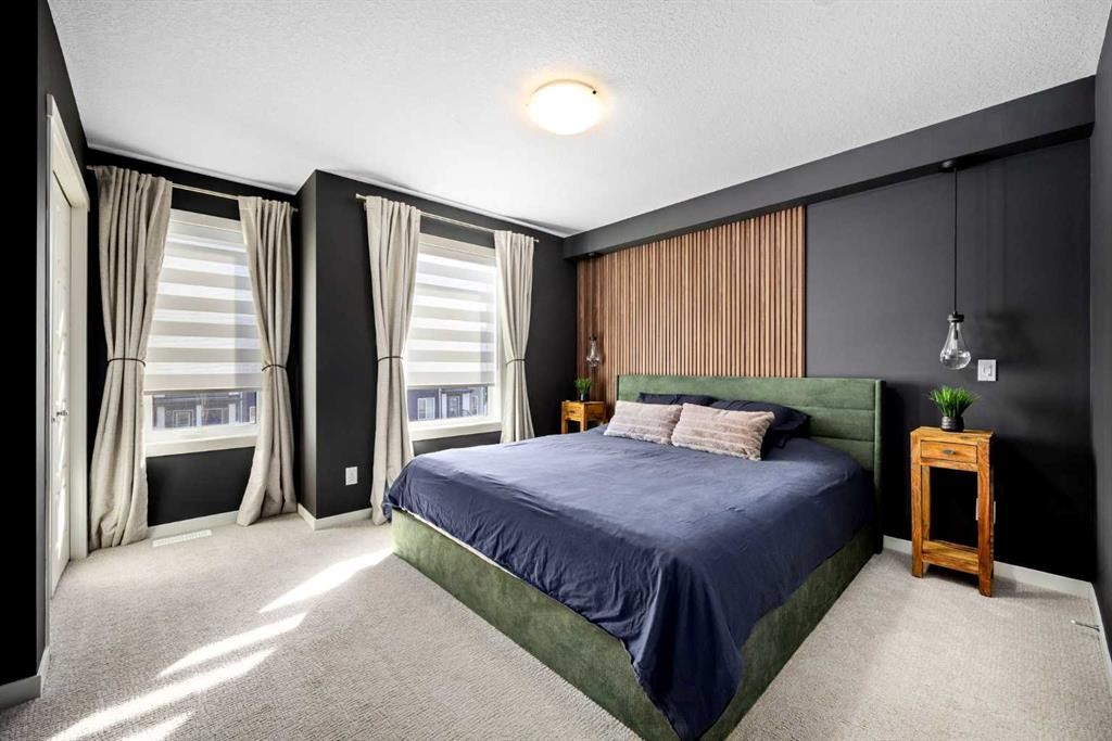 403-474 Seton Circle Se, Calgary, AB - Indoor Photo Showing Bedroom