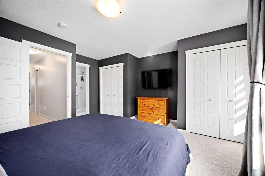 403-474 Seton Circle Se, Calgary, AB - Indoor Photo Showing Bedroom