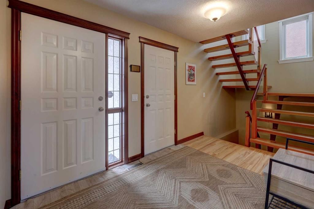 66 Scimitar Point Nw, Calgary, AB - Indoor Photo Showing Other Room