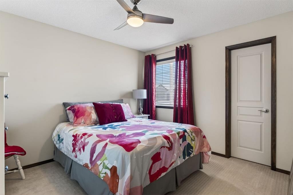 3 Pantego Avenue Nw, Calgary, AB - Indoor Photo Showing Bedroom