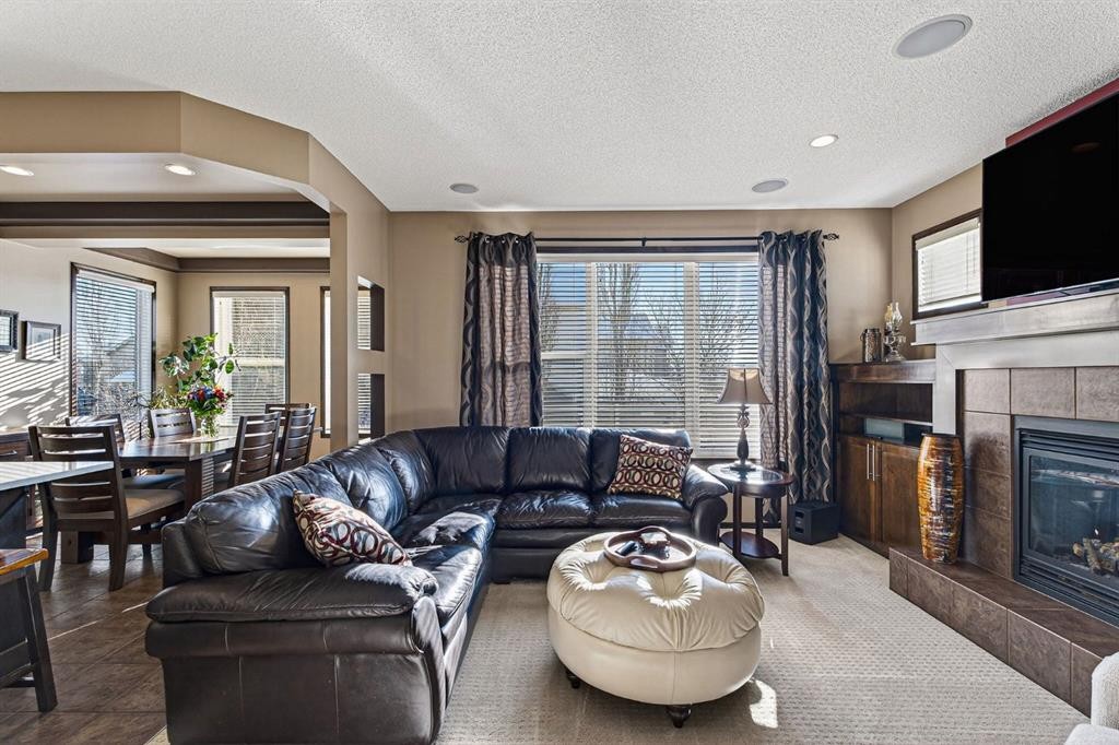 3 Pantego Avenue Nw, Calgary, AB - Indoor Photo Showing Living Room With Fireplace