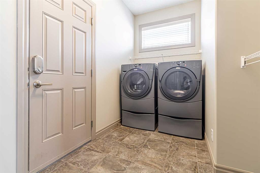 67 Evergreen Row Sw, Calgary, AB - Indoor Photo Showing Laundry Room