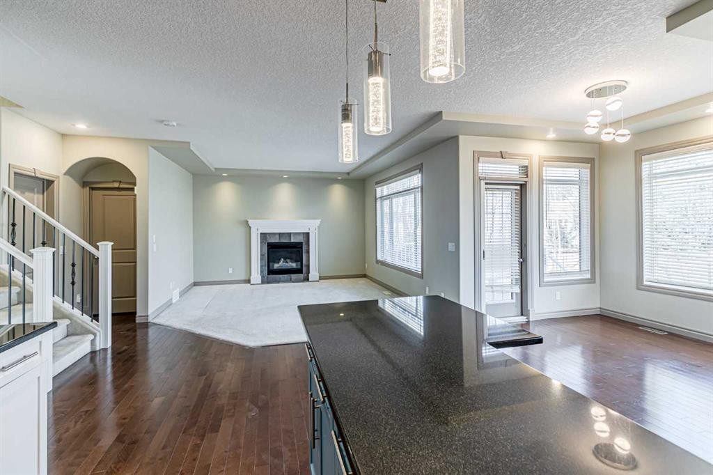 67 Evergreen Row Sw, Calgary, AB - Indoor With Fireplace