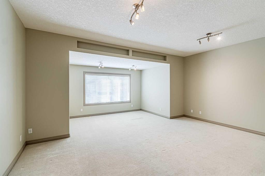 67 Evergreen Row Sw, Calgary, AB - Indoor Photo Showing Other Room